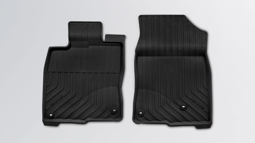 Tapis en caoutchouc ourlés avant et arrière de la Honda Civic 4 portes.