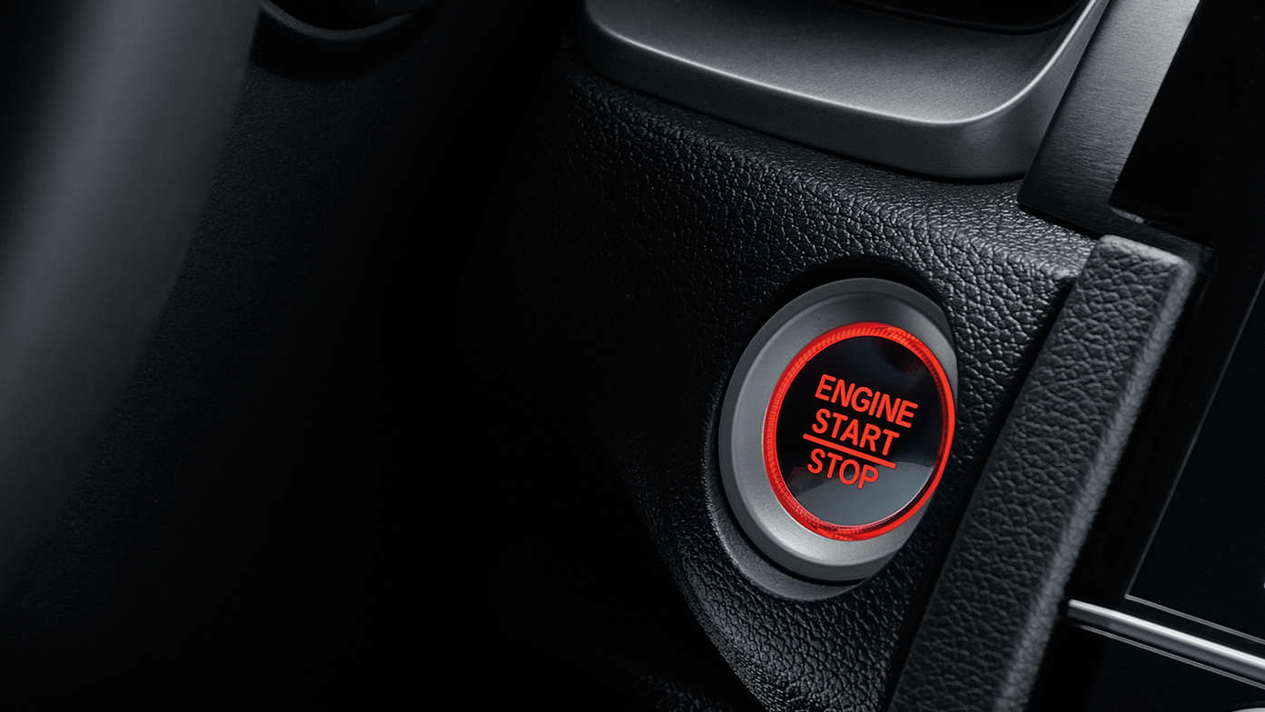 Plan rapproché du bouton de démarrage de la Honda Civic 4 portes.