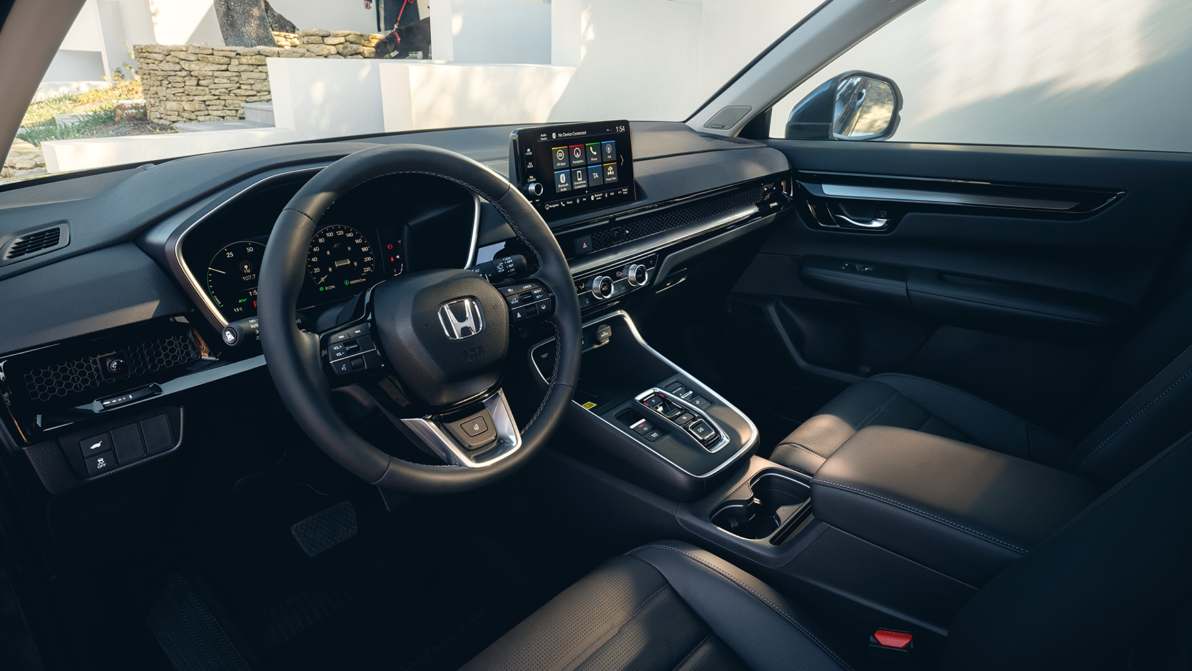 Prise de vue de trois quarts de l’intérieur du SUV Honda CR-V hybride.