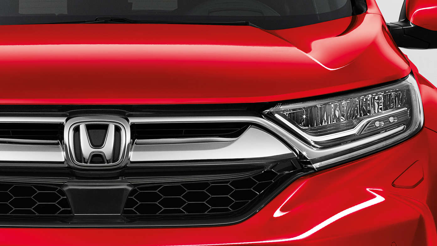Gros plan sur la calandre à volets actifs du Honda CR-V.