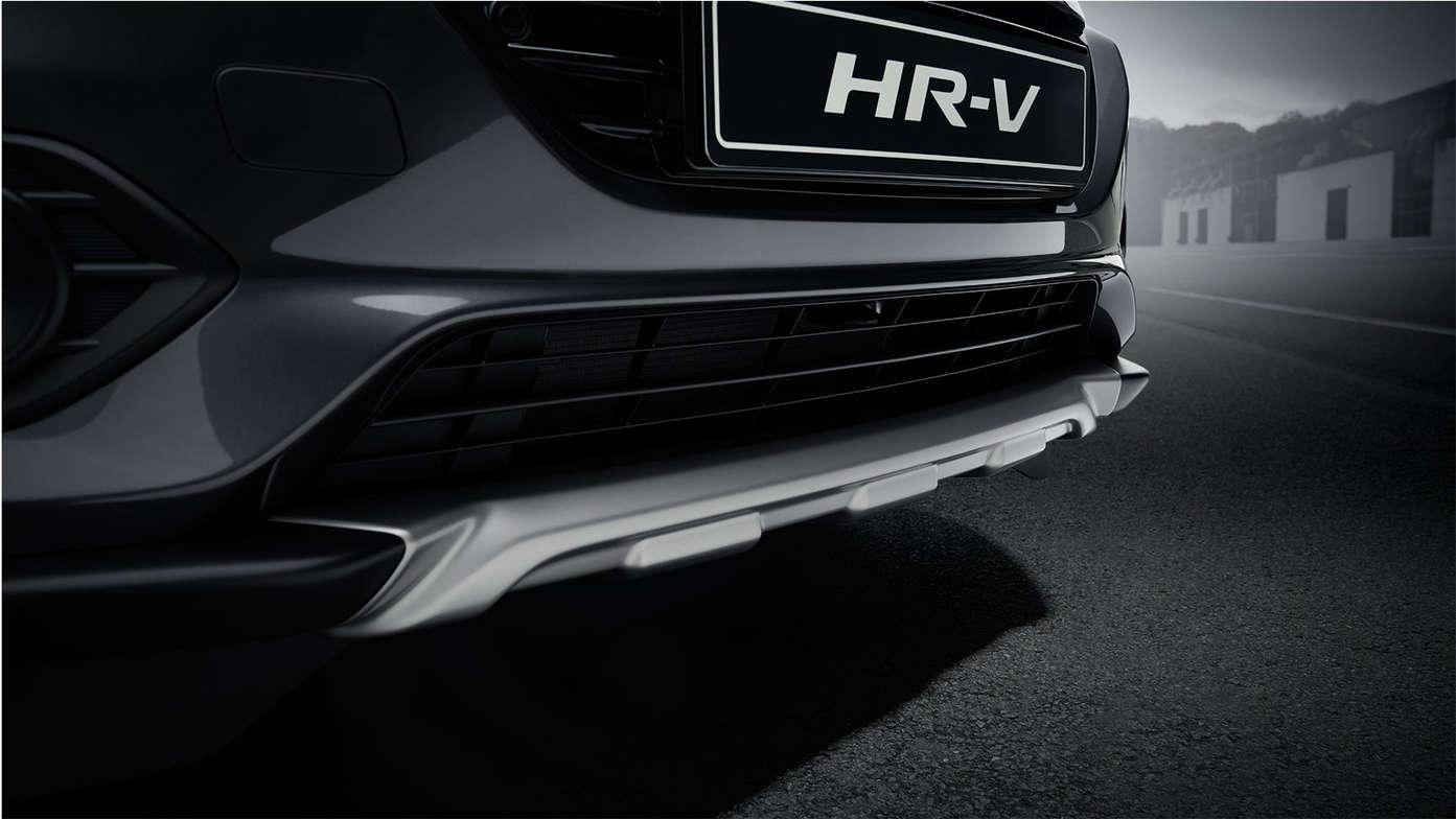 Gros plan sur la garniture avant du Honda HR-V en couleur titane.