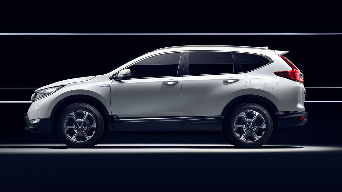 Vue lat&eacute;rale du Honda CR-V Hybrid.