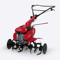 Motobineuse compacte de trois quarts face, tourn&eacute;e vers la gauche.