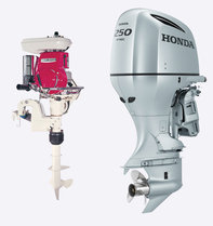 Two Honda Marine engines on white background